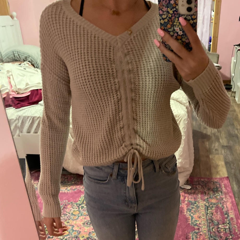 tan sweater